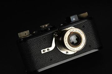 Picture of 0-Series SN 129 (c.1923/24), with Leica I (Model A) features, a refurbished top plate, off-centre tubular viewfinder and Anastigmat 3,5/50