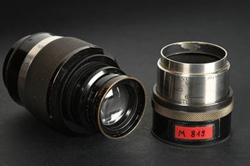 Picture of Prototype Fat Elmar 4/90 lens, with diamond-knurled focusing mount, and prototype FIKUS lens hood (ex-Leitz Museum M819)