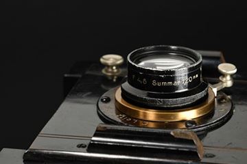 Picture of Summar 4,5/120 lens in black/brass finish made by Ernst Leitz Wetzlar for Goltz & Breutmann MENTOR camera, Dresden, Germany (c.1912), possibly made before the birth of the UR-Leica